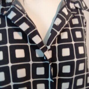 NOTATIONS Checkered Blouse: A Wardrobe Essential